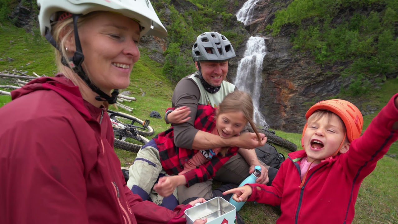 Henrika, Patrik, Felix, and Majken biking to Rottenvikfossen in Lyngen - Visit Lyngenfjord