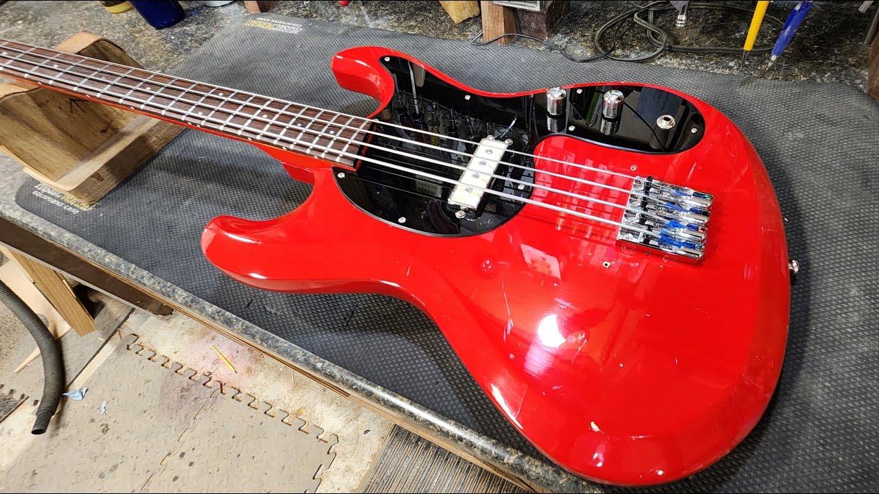 Vintage Mosrite-style Guyatone EB-2 short scale bass guitar repair