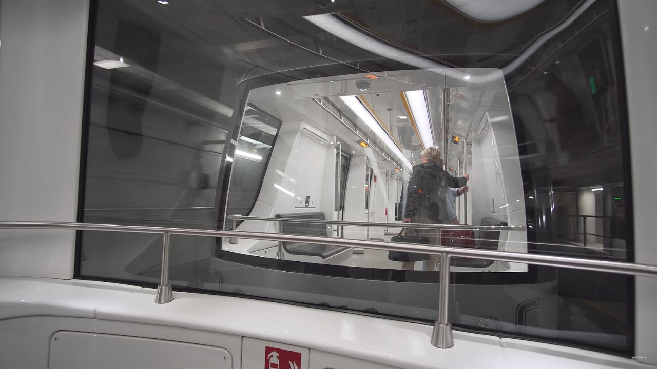 Germany, Munich Airport, Pendelzug ride from G-H gates to K-L gates, 4X escalator, 1X elevator