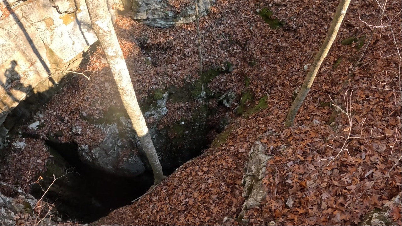 Deep Blue Hole Found At The Bottom Of This 500ft Deep Cave