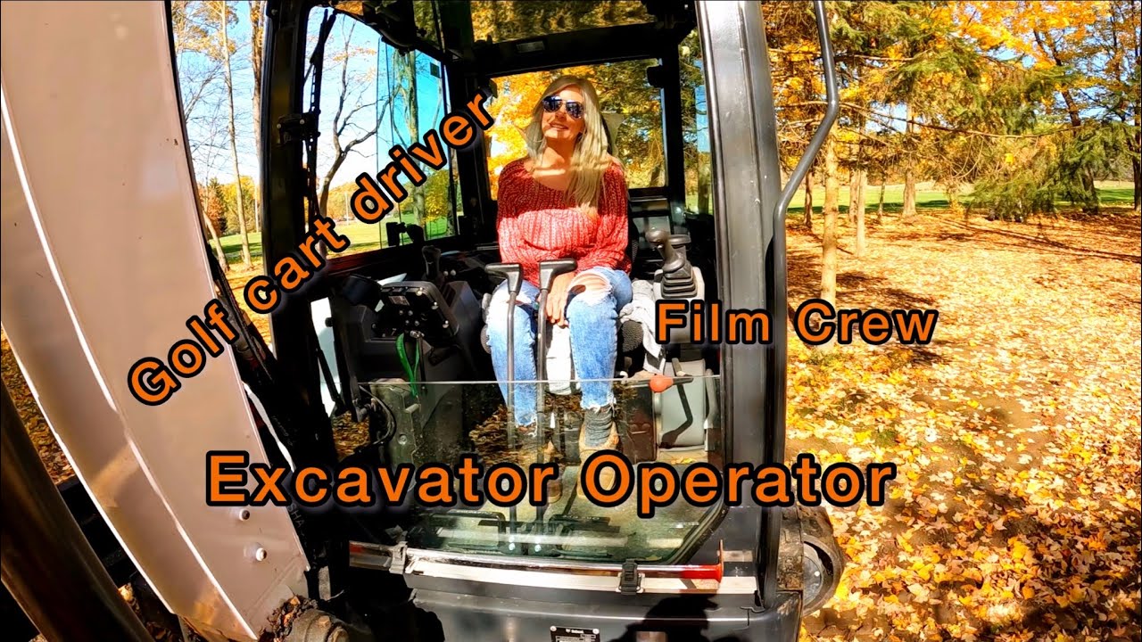 Old school hand splitting firewood. Multi-talented helper. Bobcat E60 r2