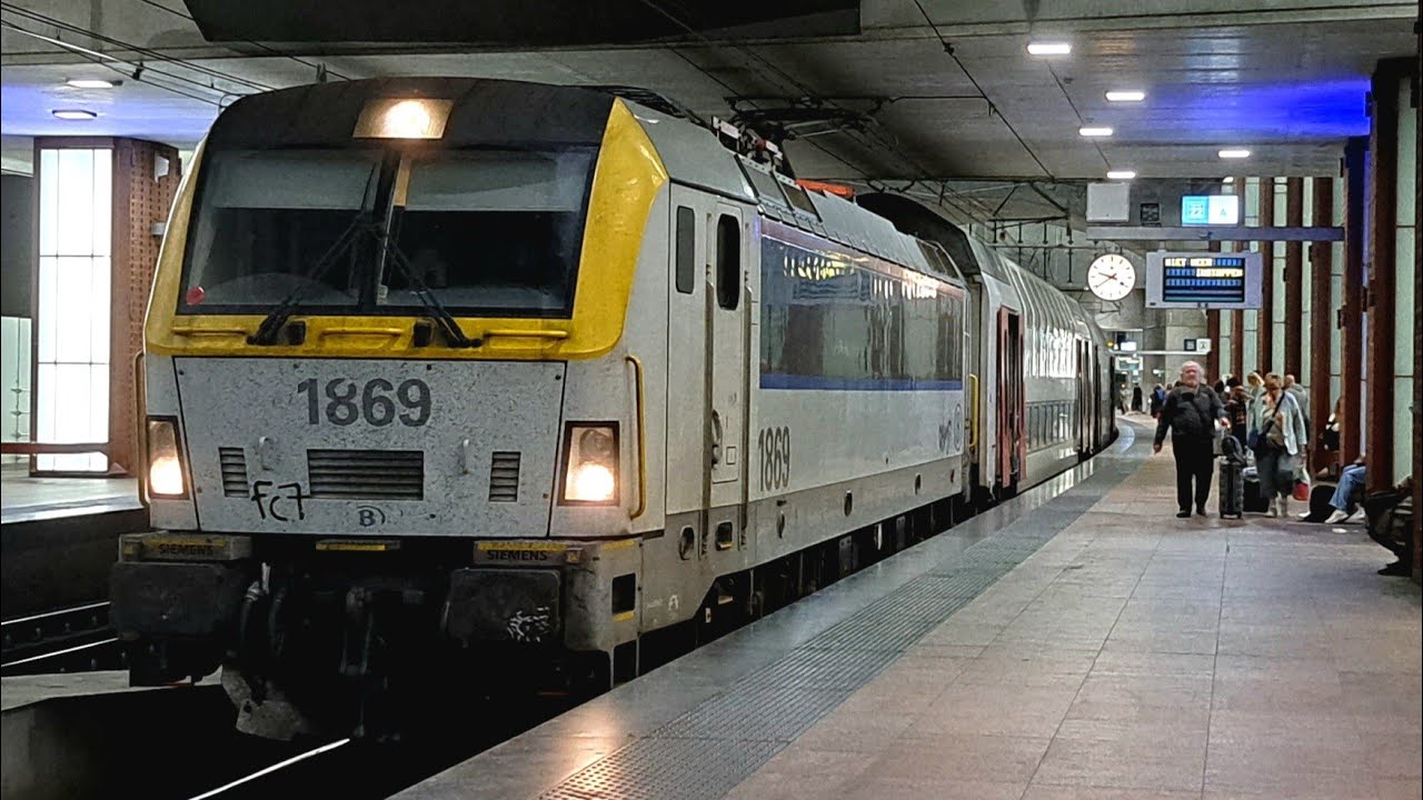 NMBS HLE 1869 met M6 65036 vertrekt vanaf Antwerpen Centraal