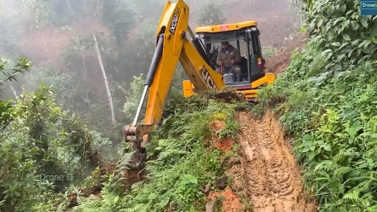 Sudden Fog Covers Worksite-Cattle Road Transformation with JCB Backhoe