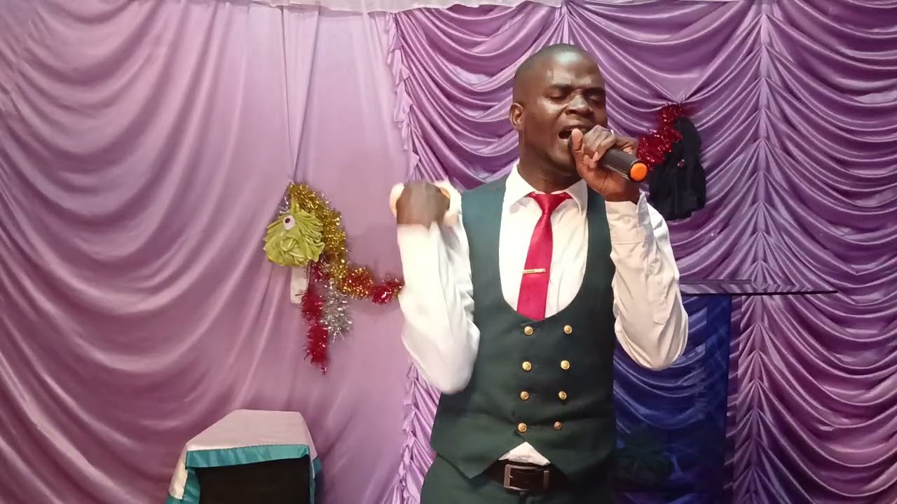 MIN. FRED WAFULA BRINGS HEAVEN  ON EARTH DURING THE SUNDAY  FOR DENNIS AND GRACE MARRIAGE  PRAYERS. 