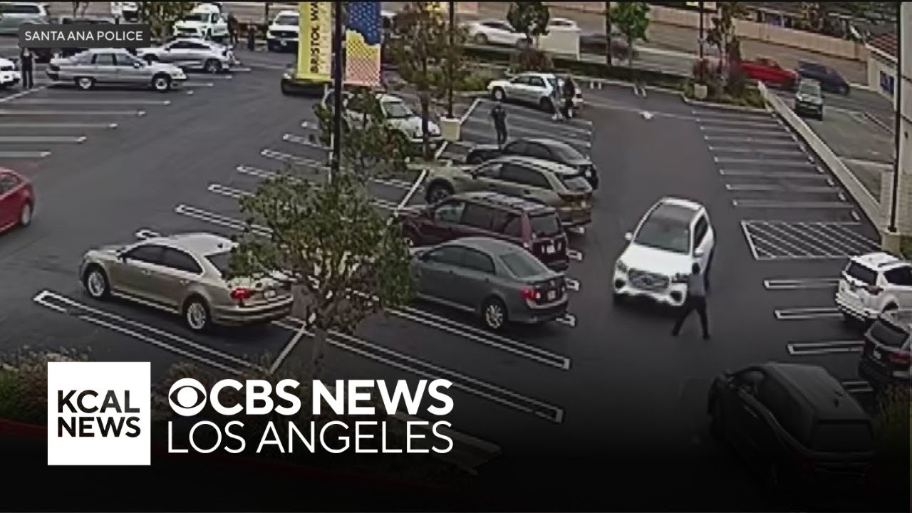 Robbery suspects run over security guard in Santa Ana parking lot