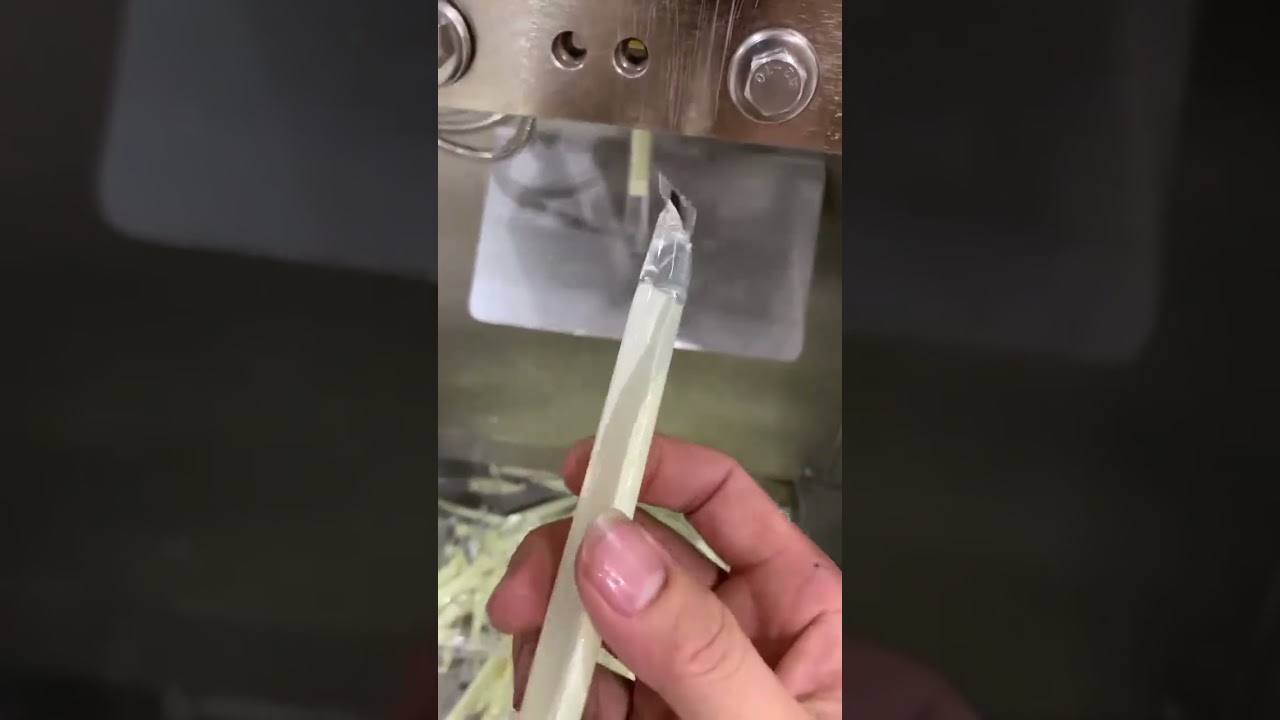 sachet packing machine with a hopper