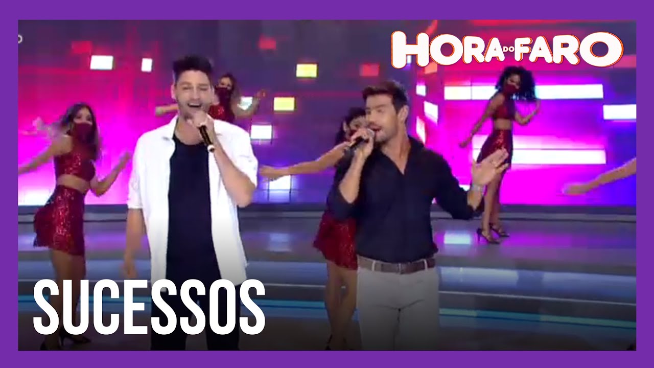Munhoz e Mariano cantam sucessos da dupla no palco do Hora do Faro