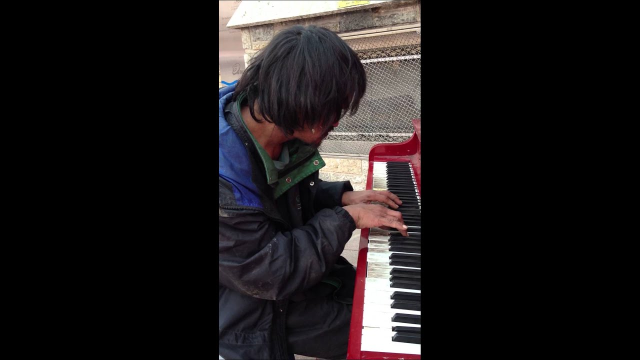 Man on the street plays beautifully