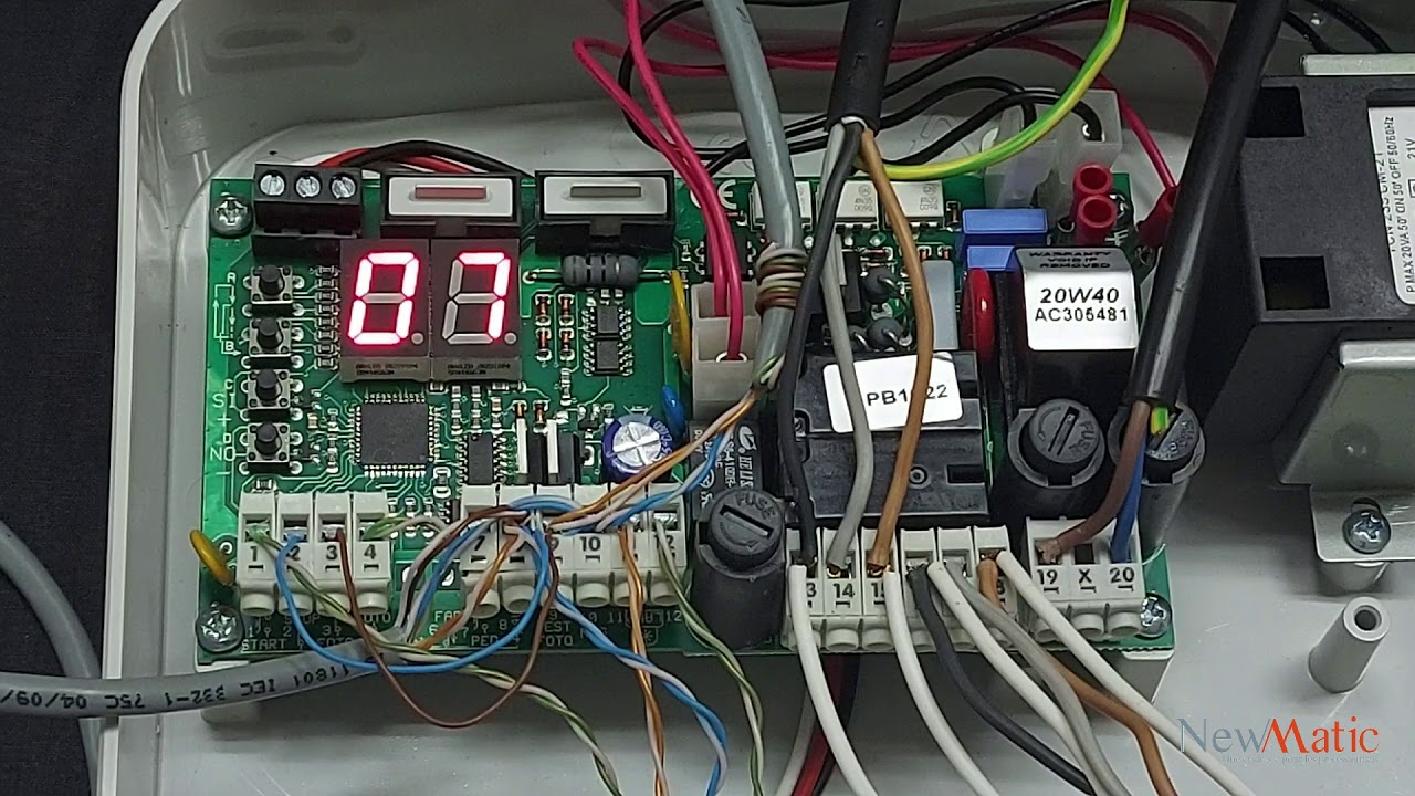 Programmation de la centrale de commande Q60A/R du KIT TECHNO 400 EUROMATIC برمجة وحدة التحكم
