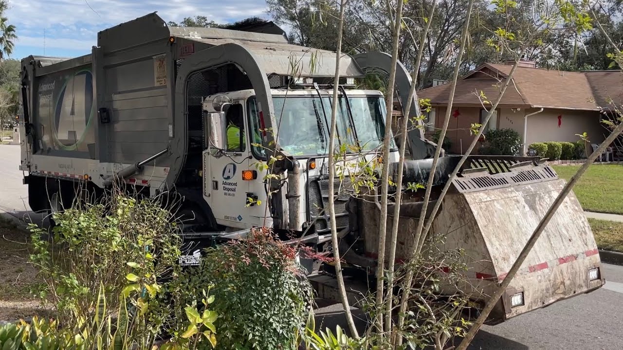 Green Clean & Rolling: WM Garbage Trucks in Orange County