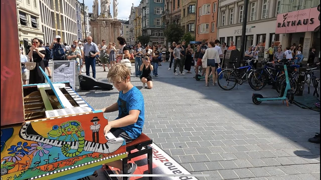 How to attract a crowd in 8 Minutes? Street Piano Performance by 11 year old boy