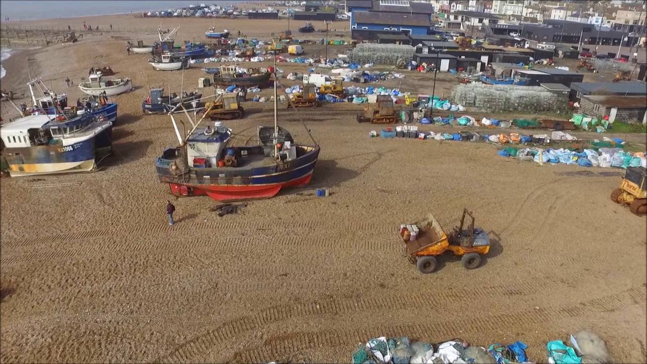 Hastings Old Town beach. Fishing boat runs aground deliberately!