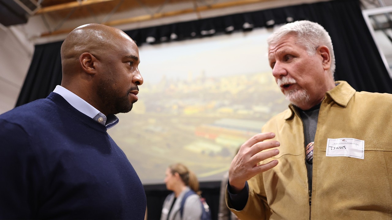 President Damani Leech, Broncos welcome feedback at Burnham Yard Community Information Meeting