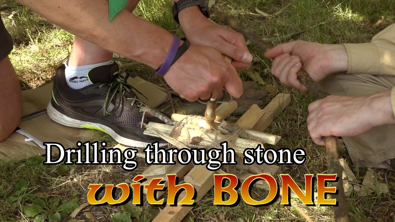 Drilling through a stone with stone-age technology