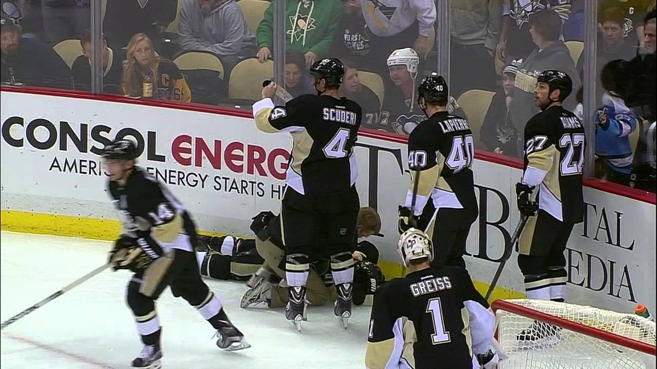 Letang takes scary fall after hit from Doan