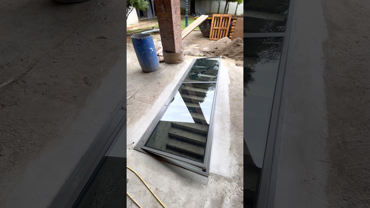 Trappe de cave en verre motorisée