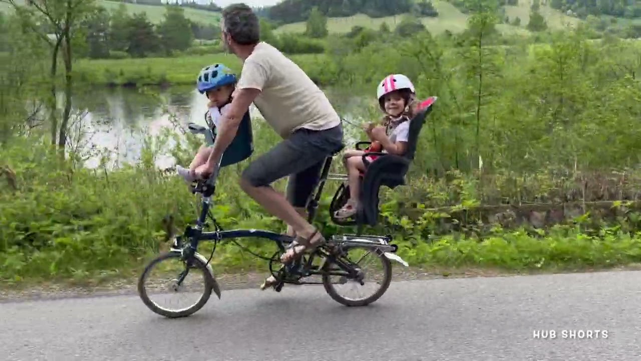Riding a Brompton bike with 2 children