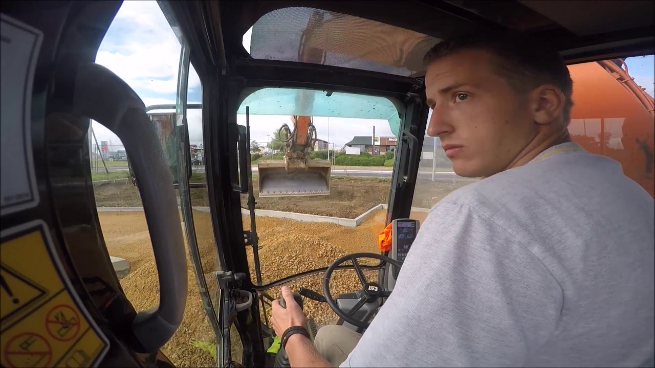 Grading gravel - CAT M316D - Cab view - GoPro HERO4