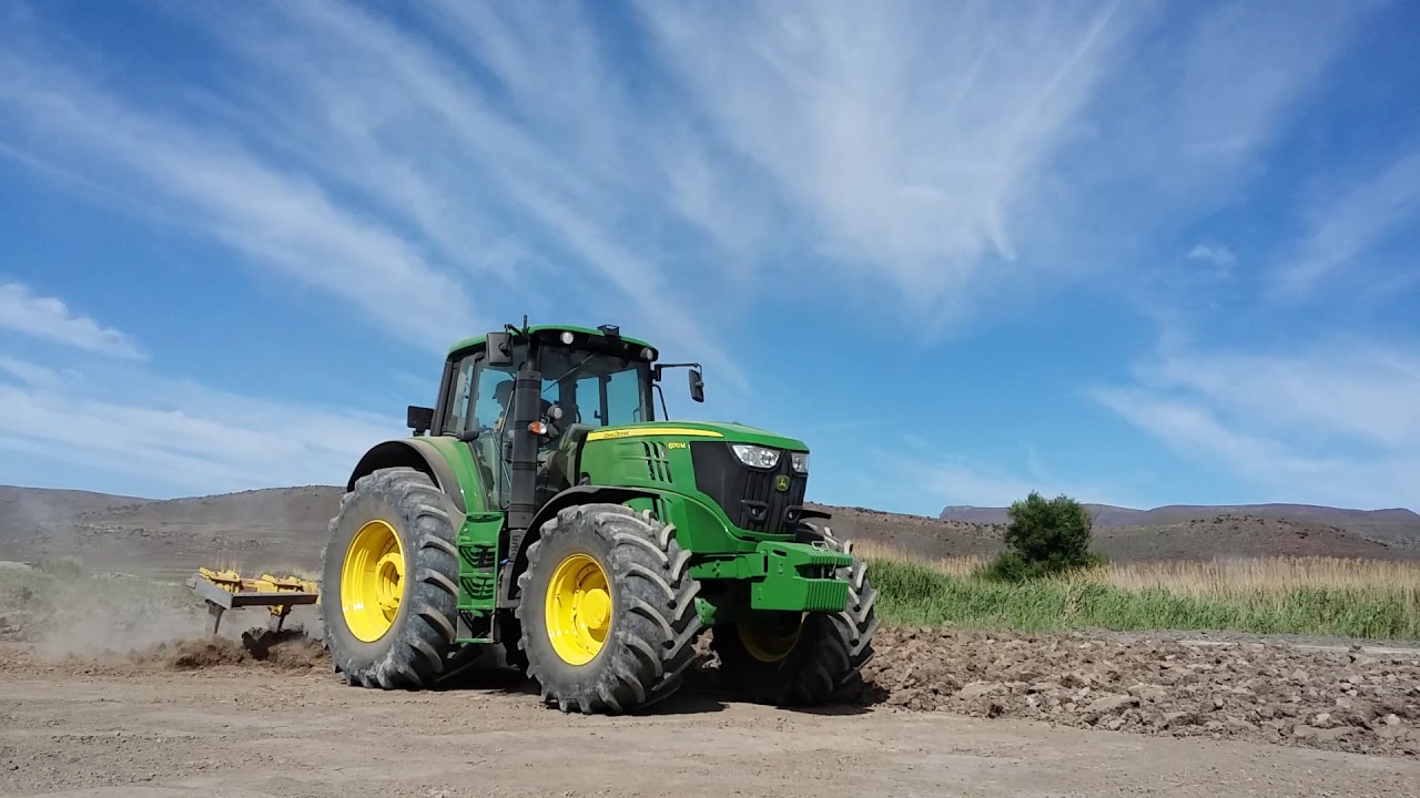 John Deere 6170m with Old ox ripper