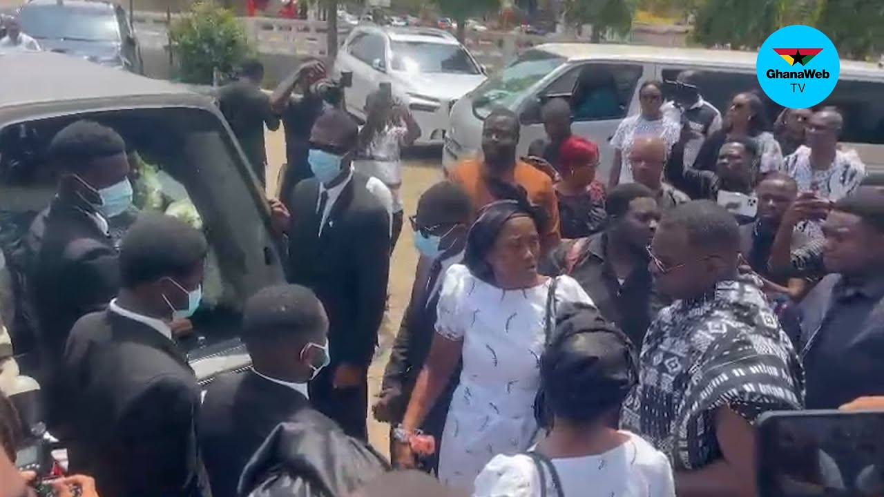 Heavy hearts as John Dumelo and family escort his father’s body out of the church