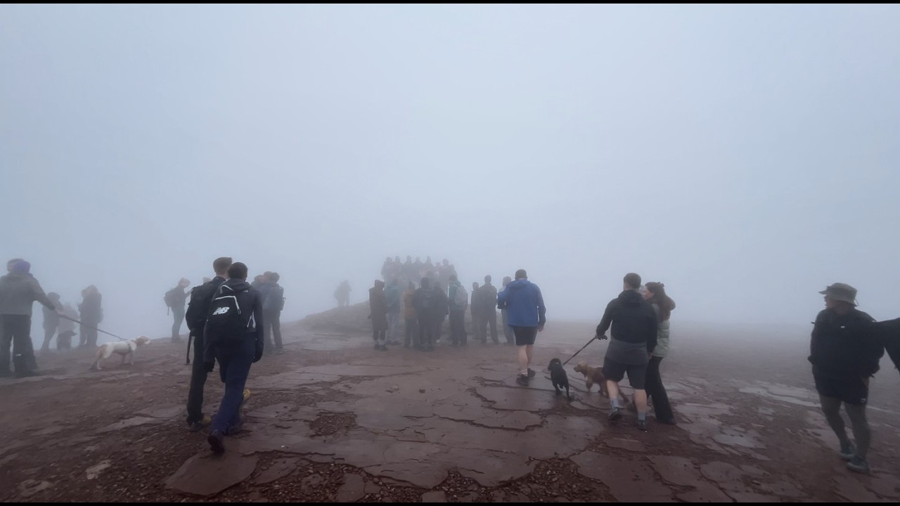 queue for photos at the top of Pen y Fan, Wales