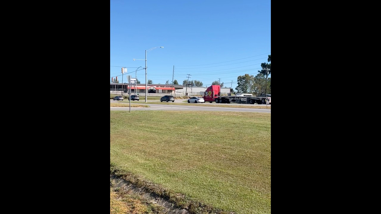 Custom Red Freightliner Century with Duals and Custom Paint