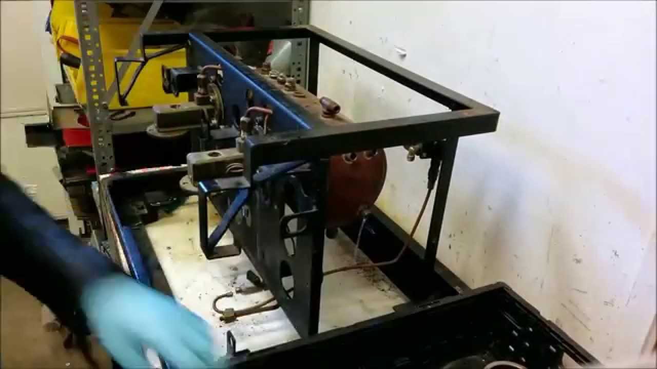 Steamworks Espresso stripping an Astoria 2 group espresso machine for refurbishing