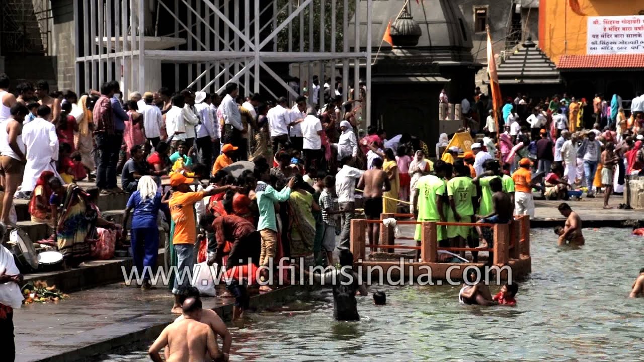 Devotees take snan during the Nashik Kumbh mela