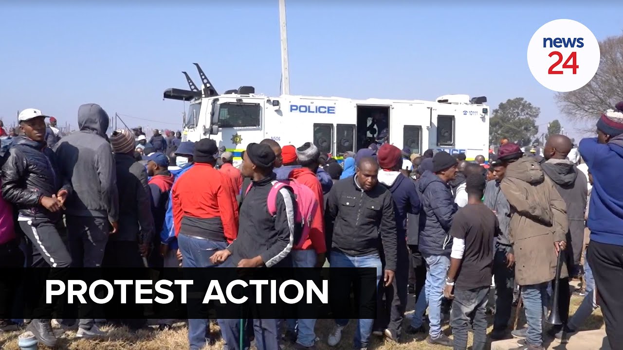 WATCH | Kagiso protest: Residents clash with police, use corrugated iron to block rubber bullets