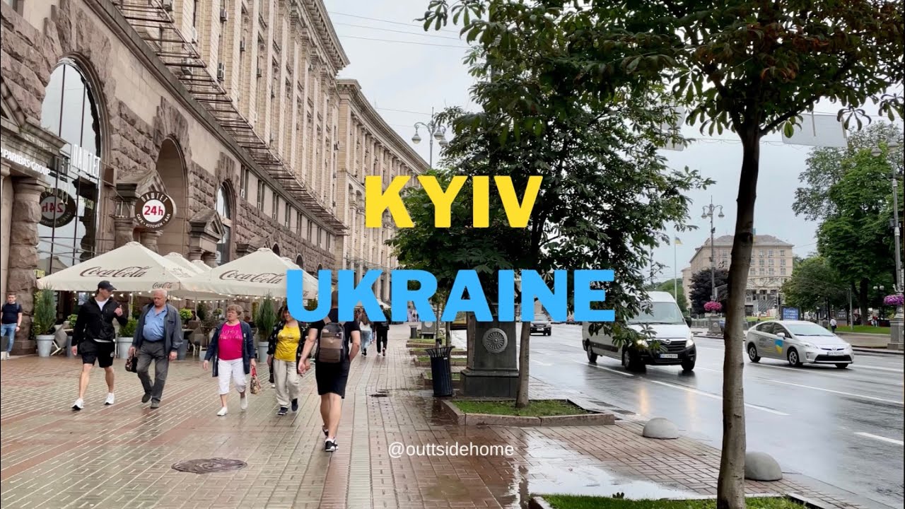 Walking tour in summer rainy Kyiv - Ukraine 2023