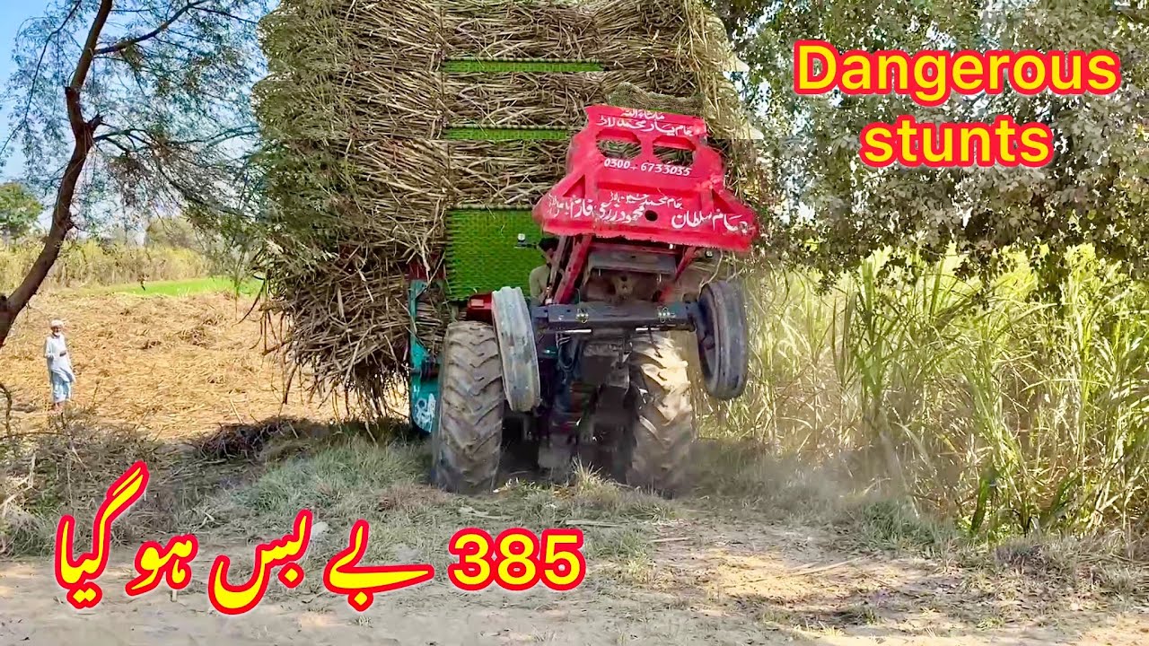 Mf 385 stuck in mud with heavy loaded trolley | heavy stunts 