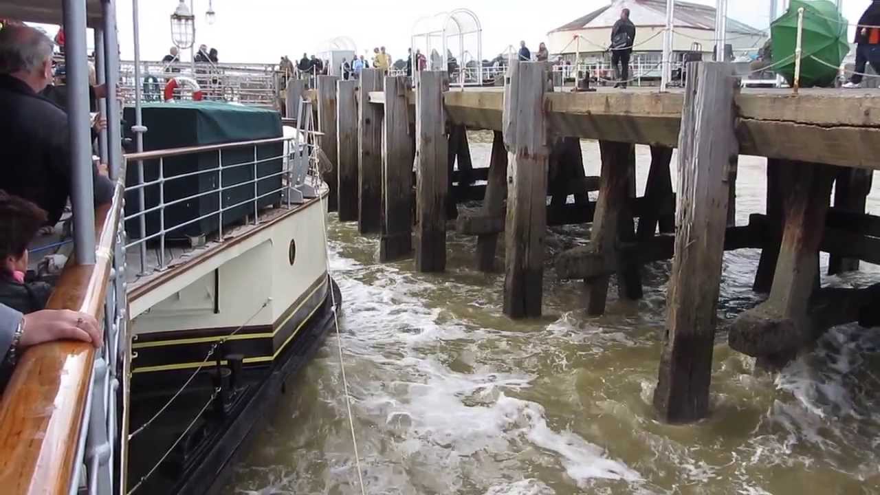 Paddle-steamer Waverley approaching and mooring at Clacton Pier