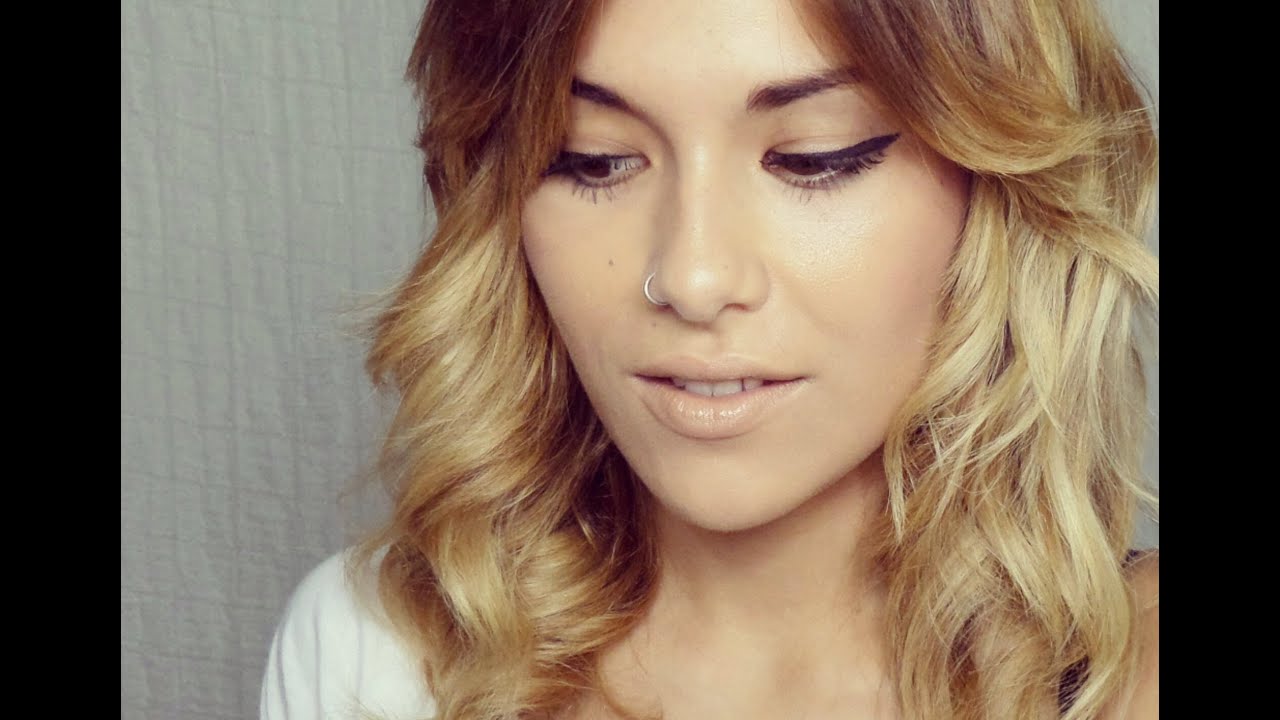 Ondas suaves en media melena .