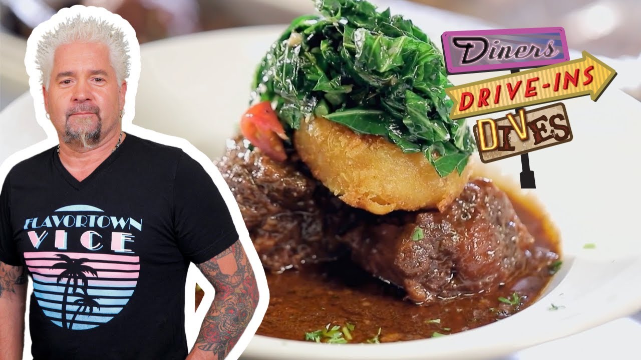 Guy Fieri Eats African Caribbean Goat Stew in Santa Fe | Diners, Drive-Ins and Dives | Food Network