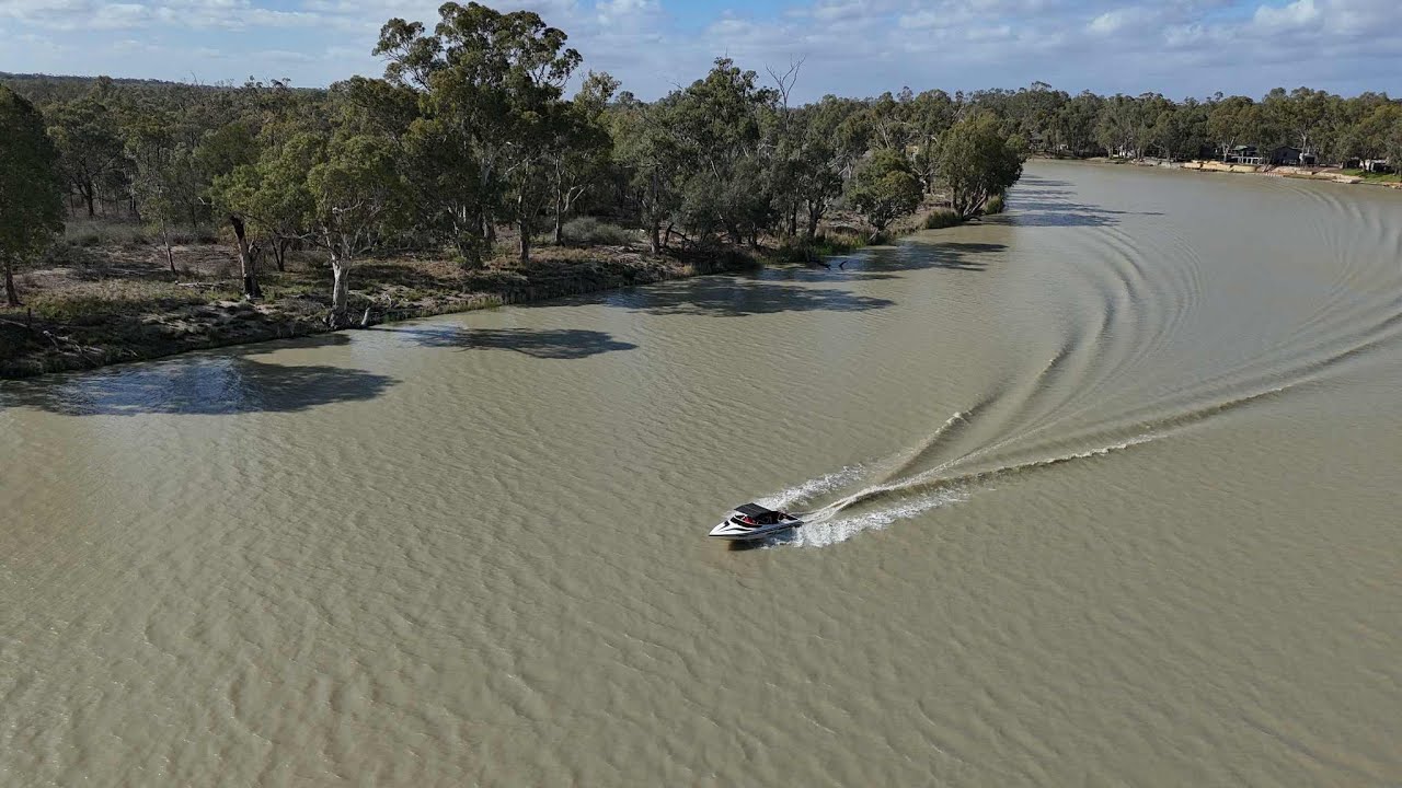 Family holiday with the boat on the mighty Murray River at Brenda Park near Morgan South Australia.
