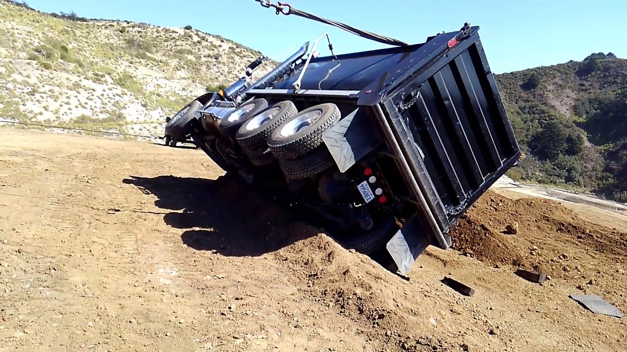 Rolling Over a Super 10 Dump Truck With an NRC Rotator