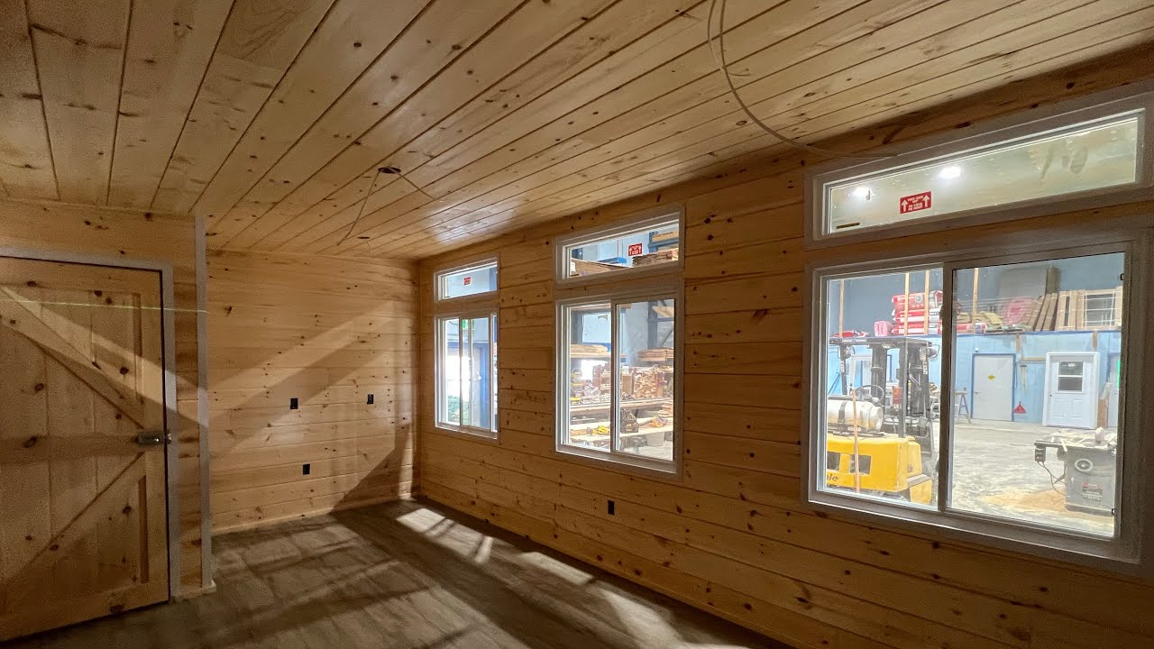 This fully insulated 12x20 tiny cabin was designed as a master bedroom!