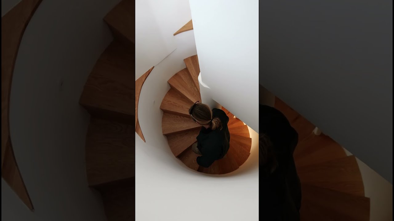 Custom Spiral Staircase with Wooden Steps & Shelving | Bespoke Carpentry in Ericeira