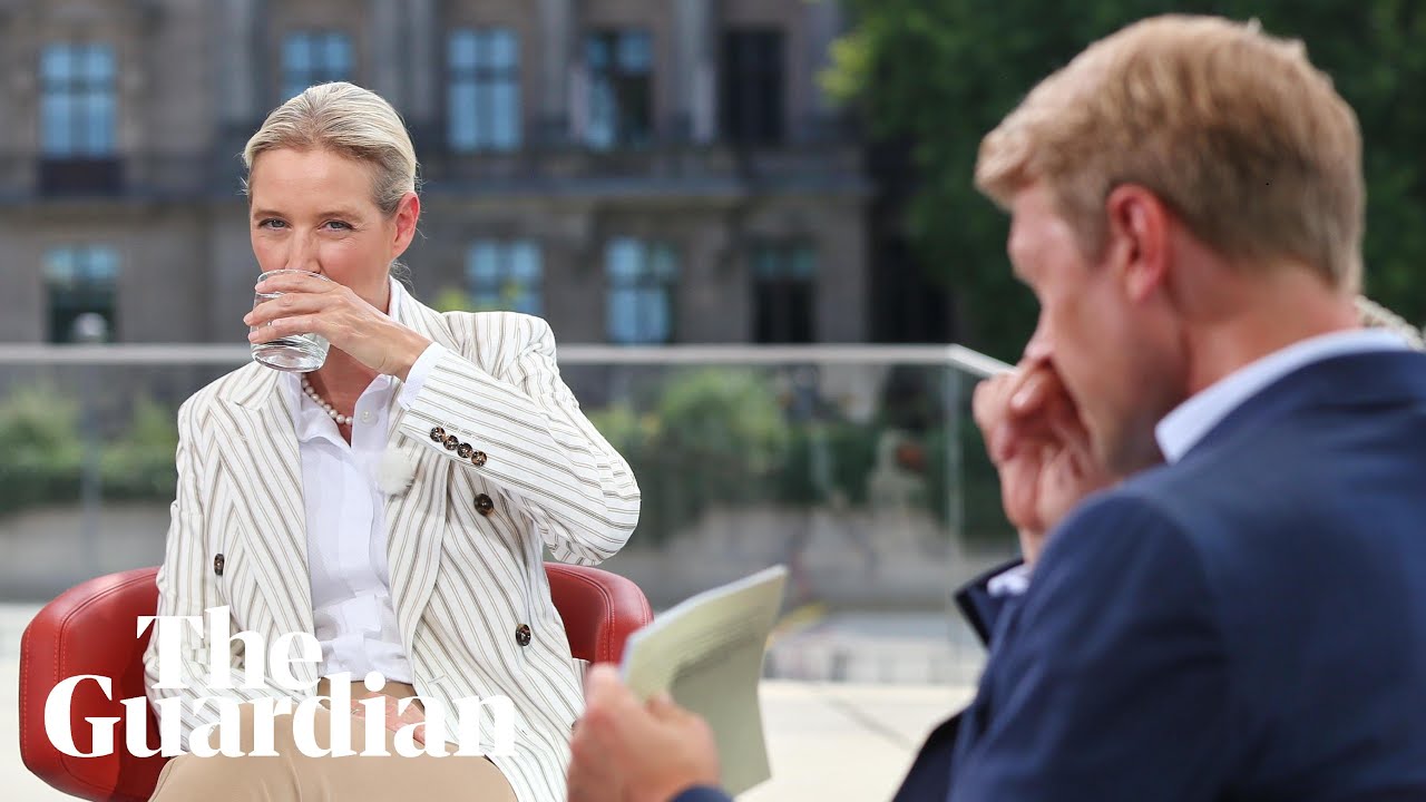 Protesters play 'schei&szlig; AfD' song during interview with far-right co-leader Alice Weidel