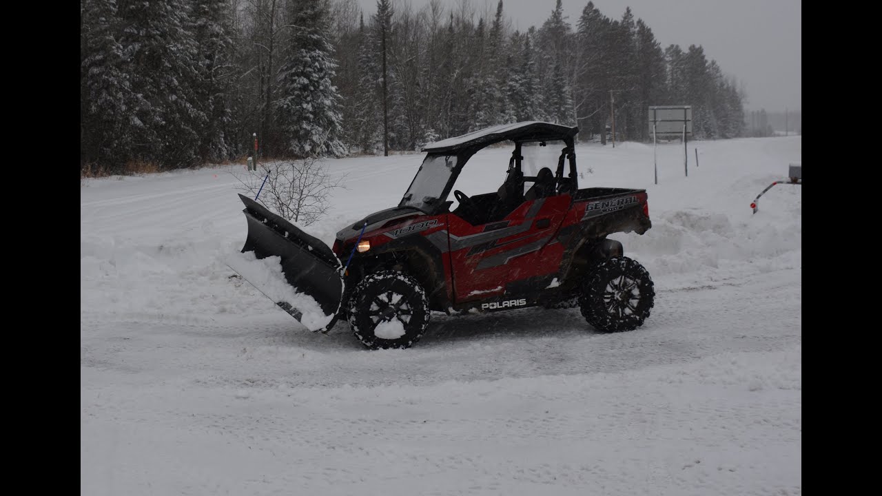 Snowplowing with the Polaris General and KFI Pro-Poly blade