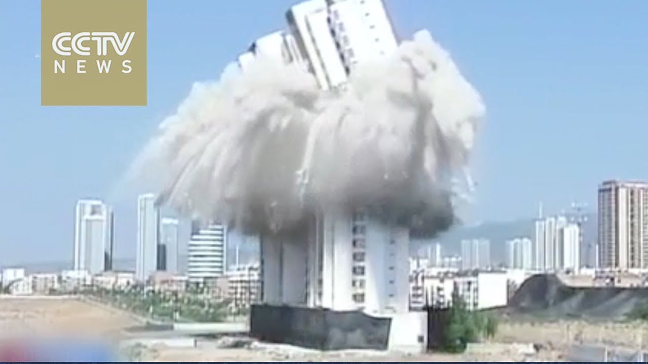 Watching skyscraper demolished with pinpoint precision in Shanxi Province