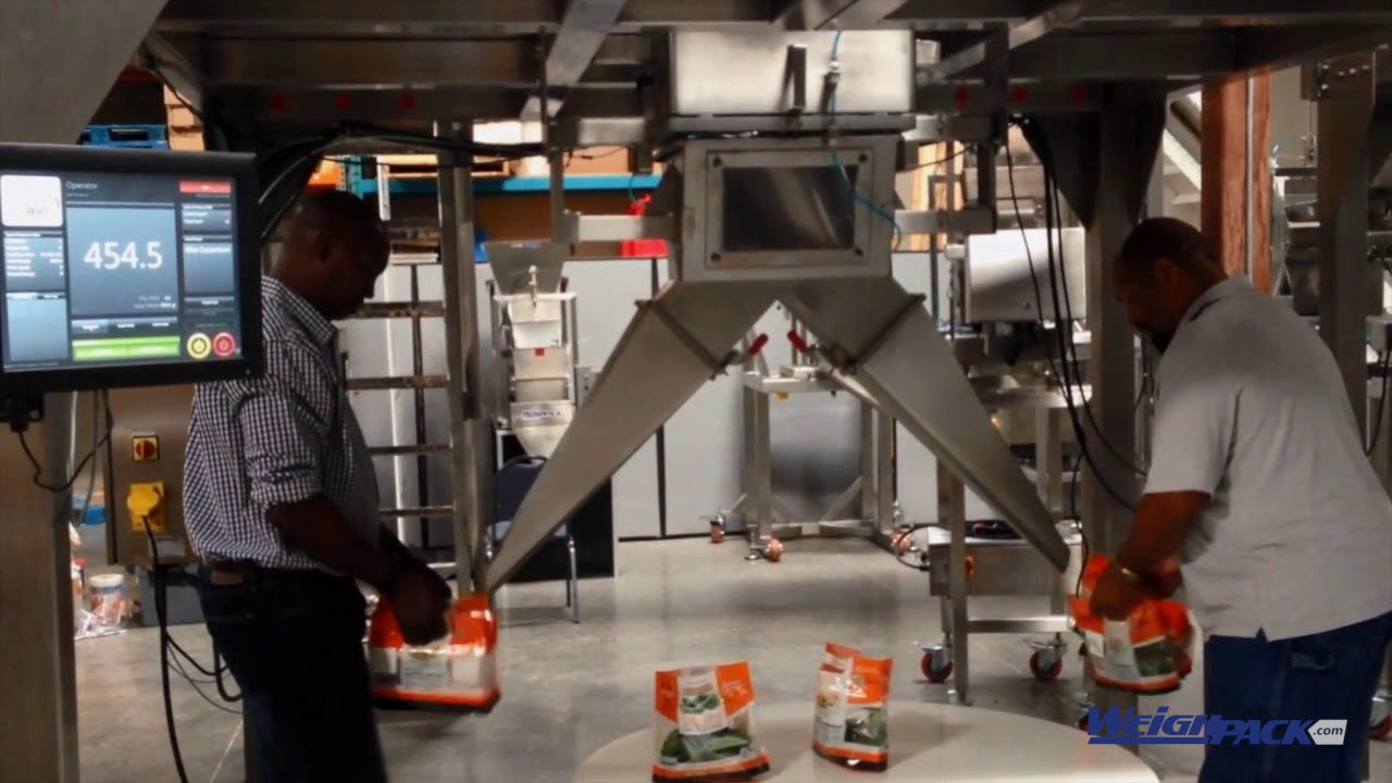 PrimoCombi&reg; multihead weigher dispensing mini cucumbers dual discharge