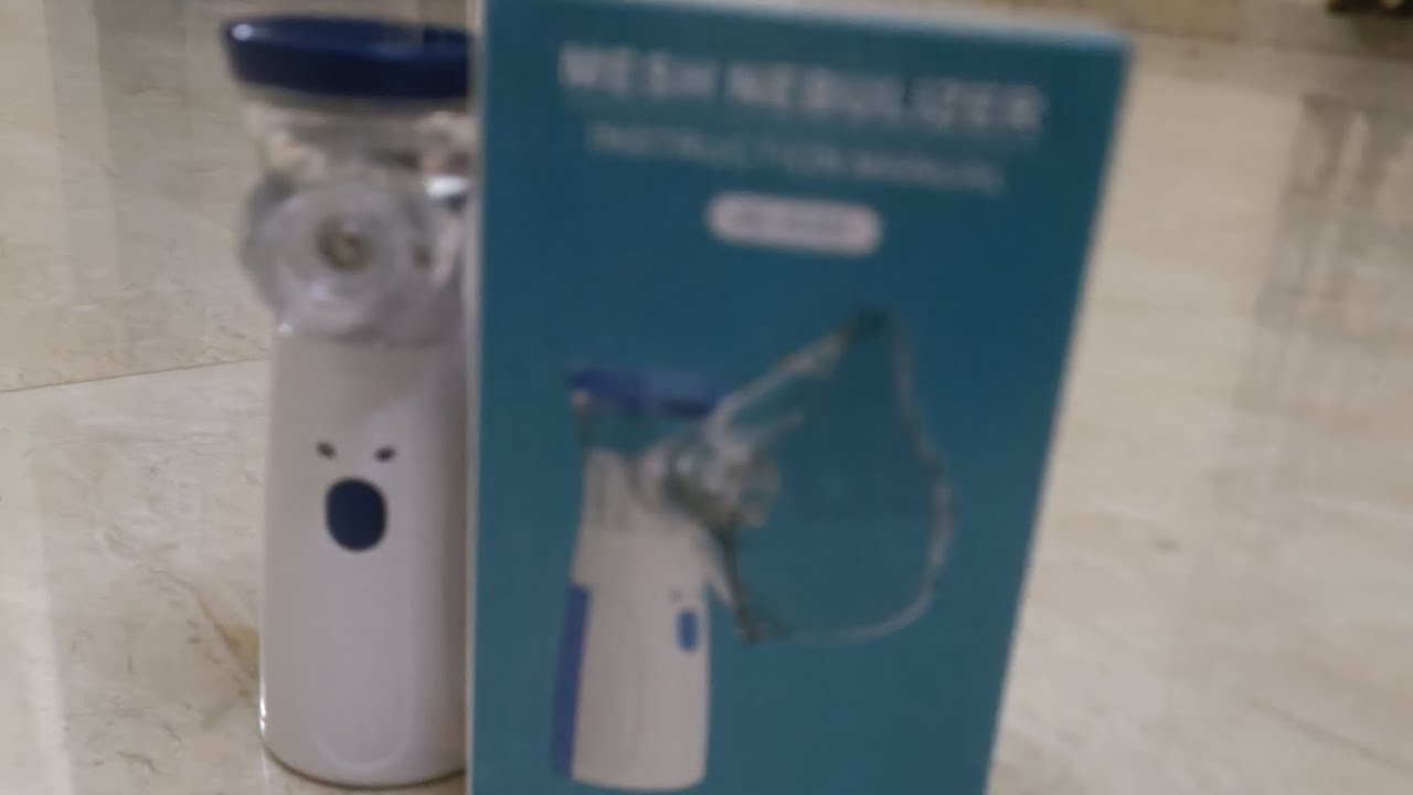 I'm Unboxing mesh nebulizer mini portable 