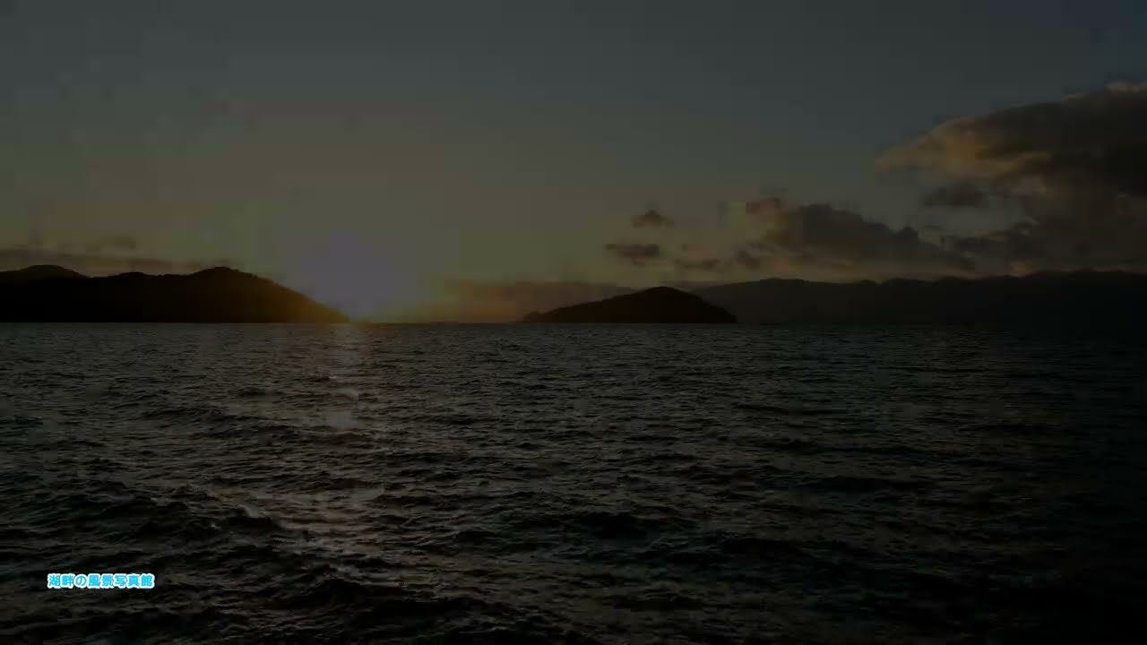 冬の夕日と琵琶湖湖岸の景色