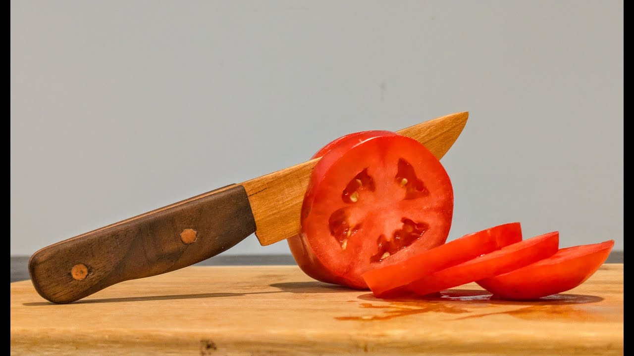 I made a wooden knife that can cut through tomatoes