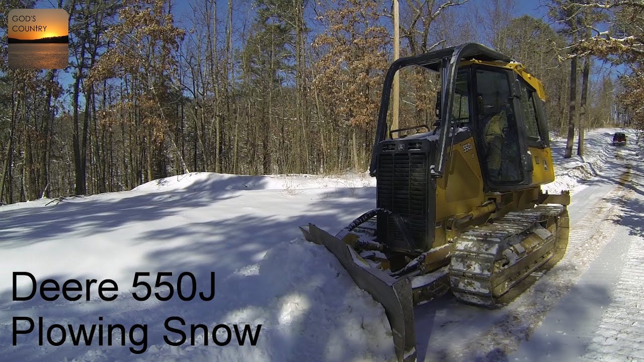 John Deere 550J Dozer Plowing Snow!
