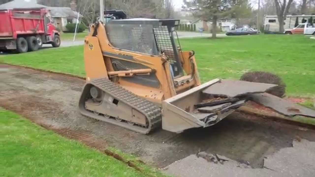 Case 445CT Ripping up Asphalt
