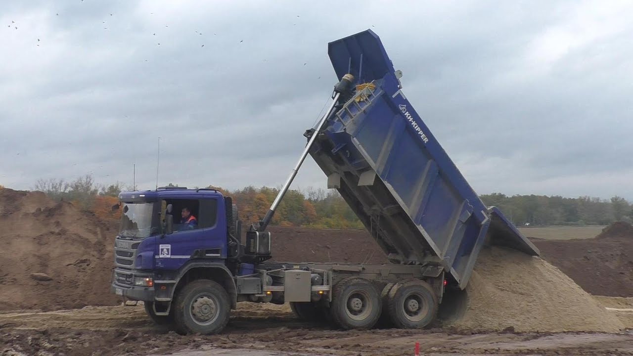 Scania P440 6x6 KH-Kipper working in the mud part 2