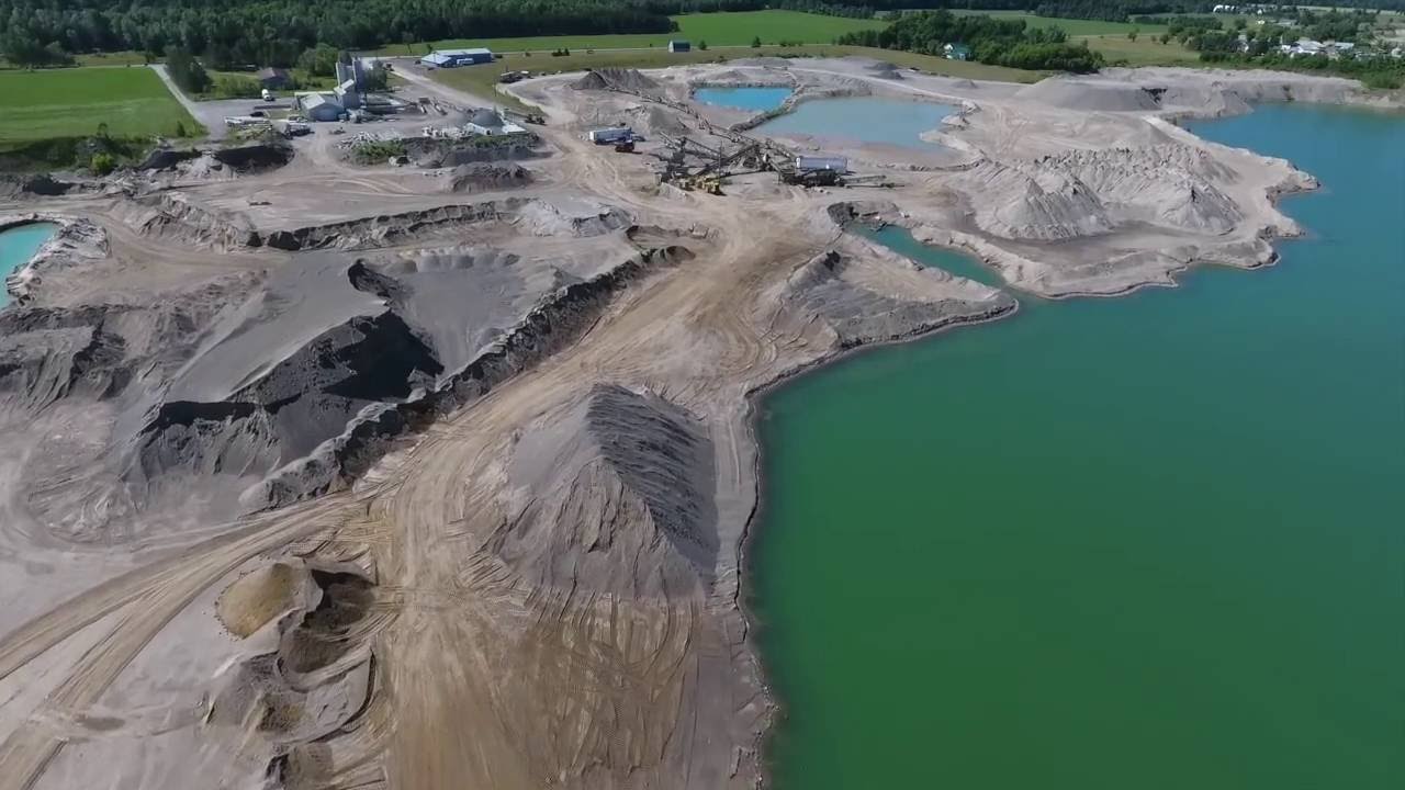 Link-Belt 308 Boom Crawler Crane Dredging at a Sand and Gravel Pit - Drone Flight