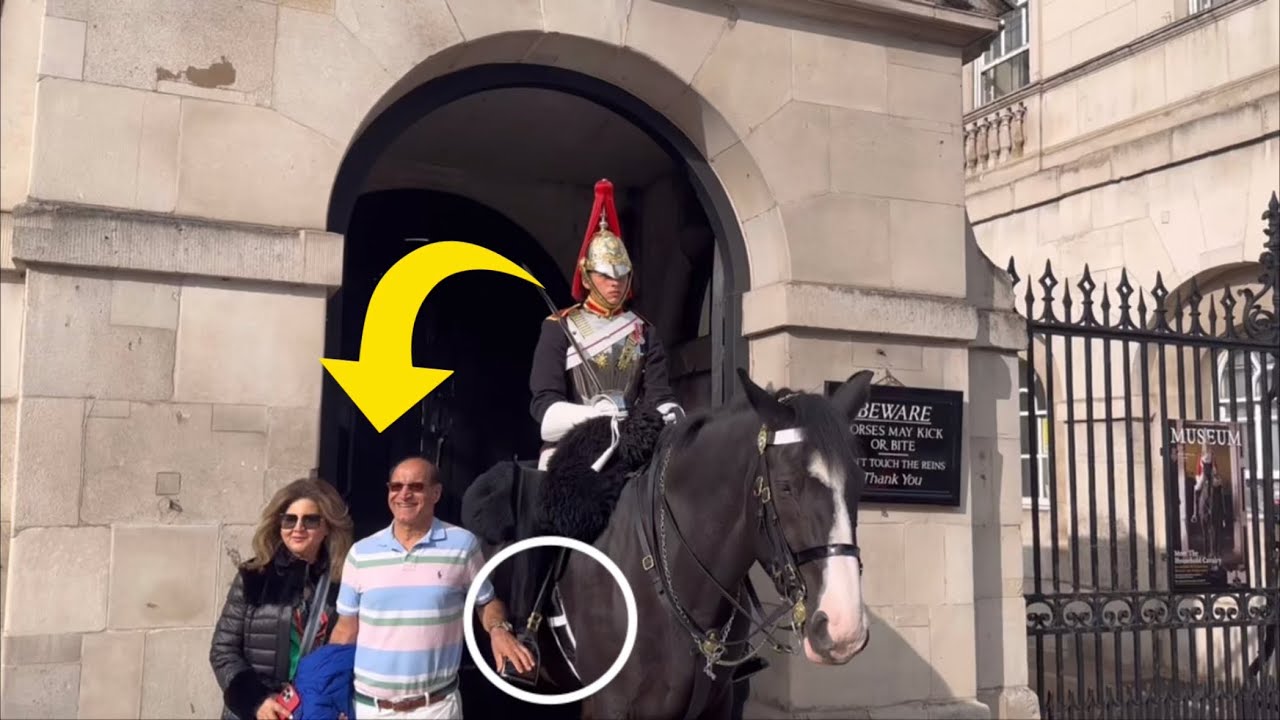 DISRESPECTFUL TOURISTS REFUSE TO RELEASE HOLD ON king’s guard boots!!?